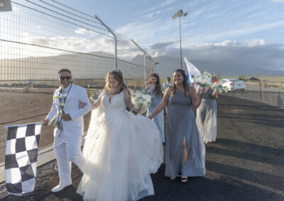 Wedding party parades at racetrack